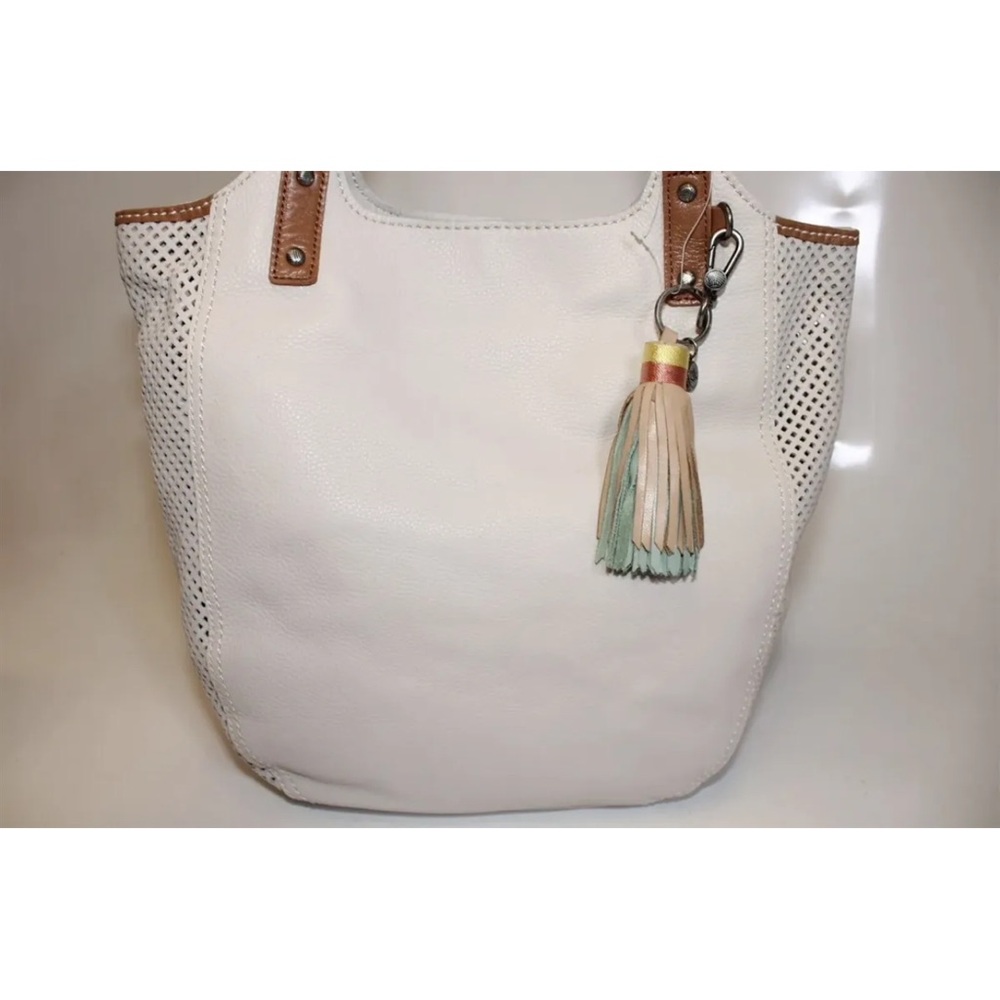 The Sak leather tote bag purse tassel perforated off white cream sold as is Boho